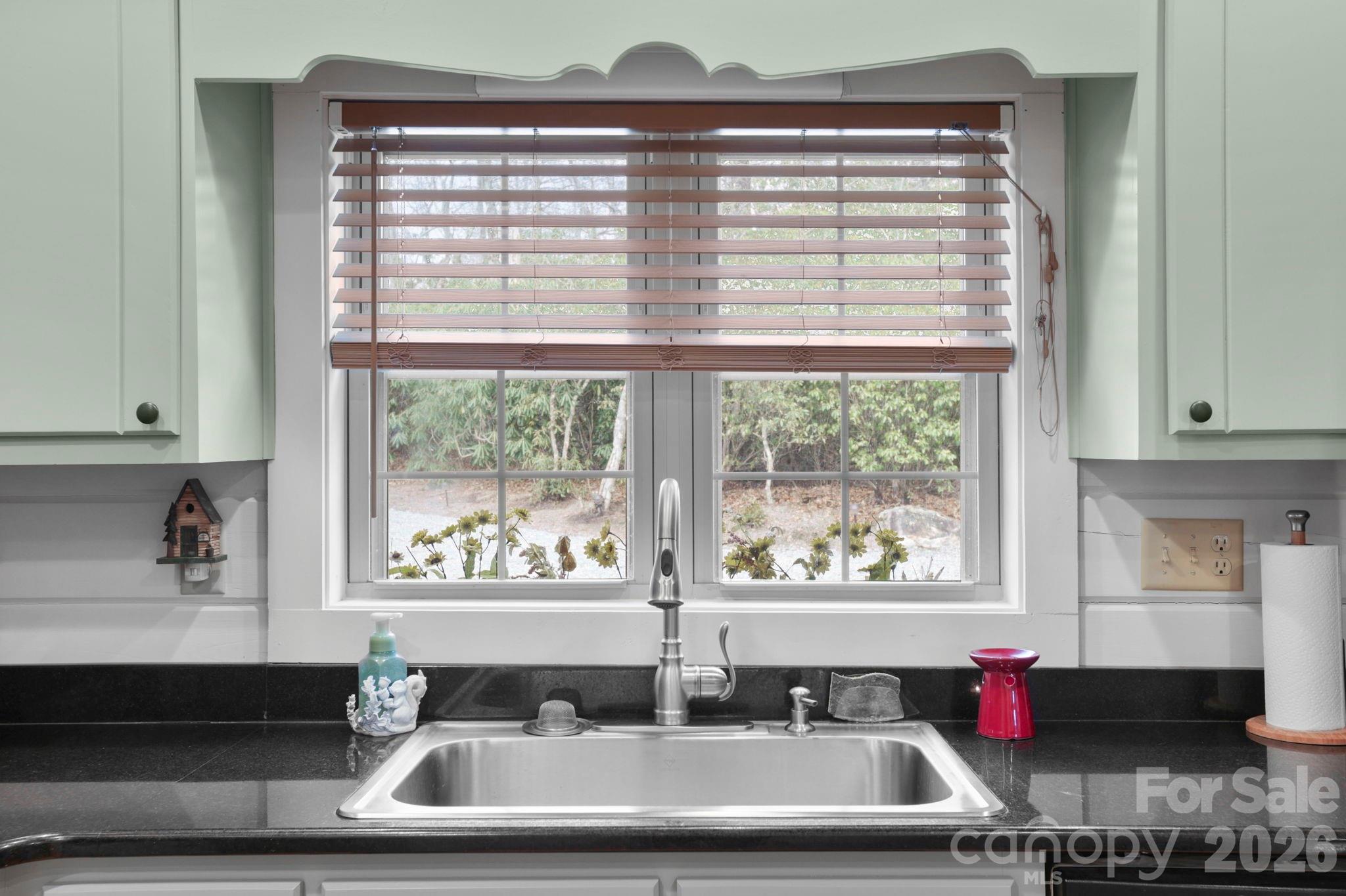 78 Longview Ridge Lake Toxaway, NC 28747 - Photo 16 of 43 a kitchen with a large window