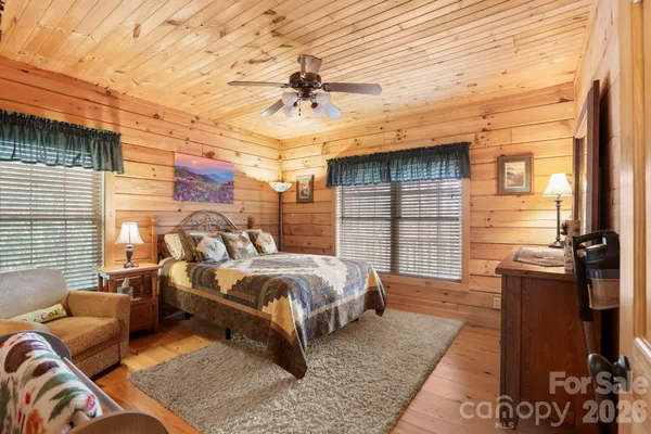 a bed room with a bed and a couch