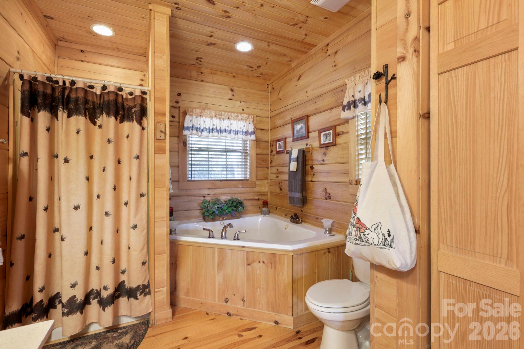 78 Longview Ridge Lake Toxaway, NC 28747 - Photo 22 of 43 a bathroom with a sink toilet and shower