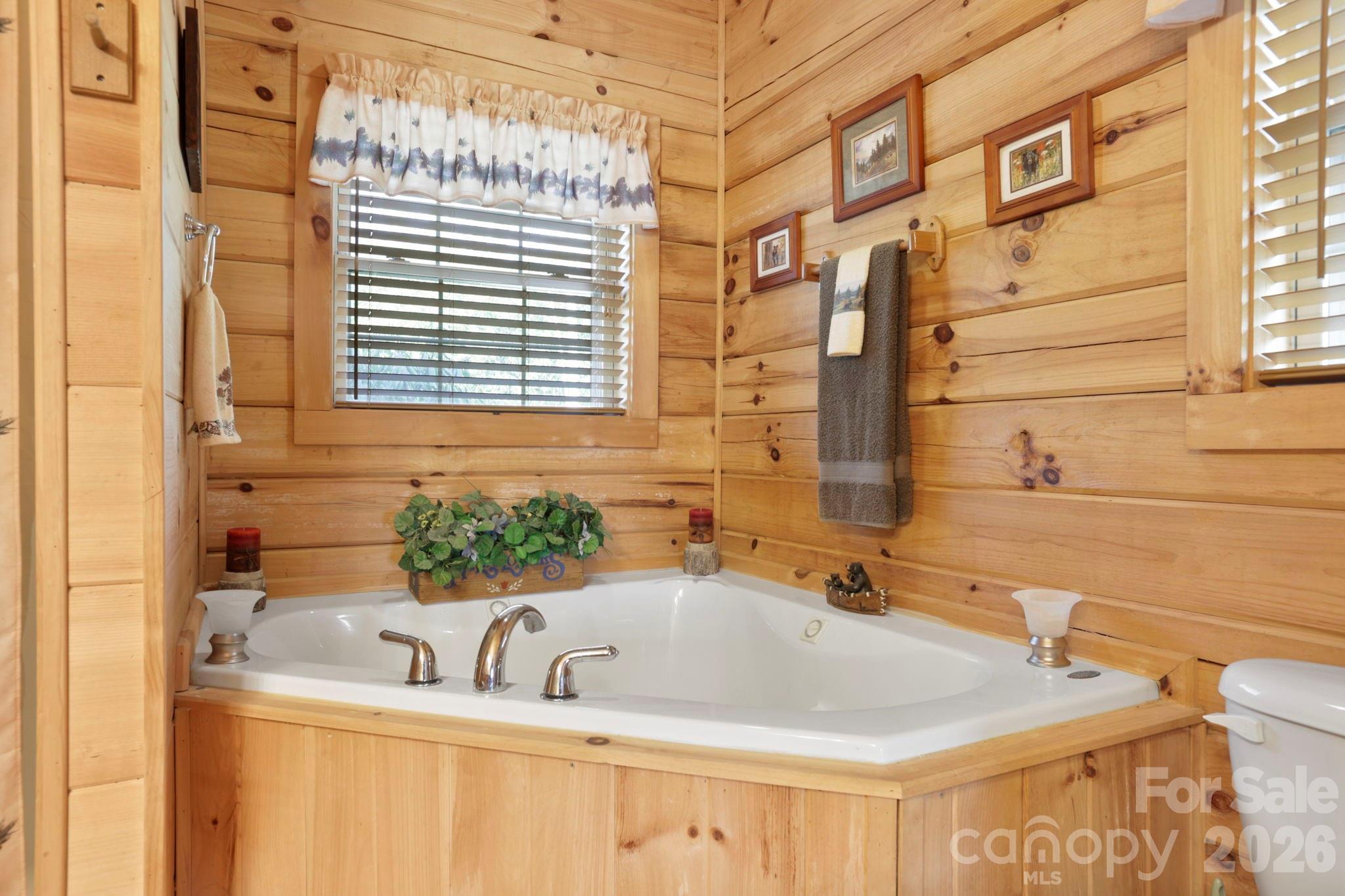 78 Longview Ridge Lake Toxaway, NC 28747 - Photo 23 of 43 a bathroom with a sink and a bathtub