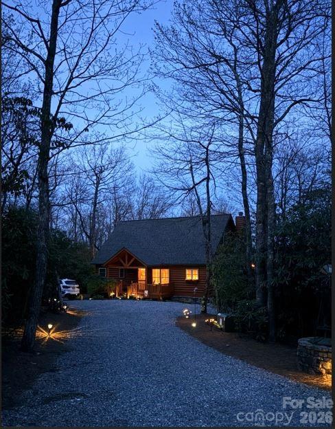 78 Longview Ridge Lake Toxaway, NC 28747 - Photo 41 of 43 a view of a house with a yard and tree s