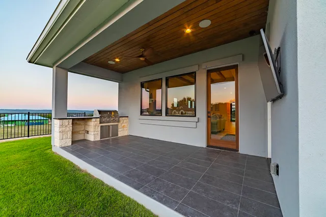 a view of a porch and garden