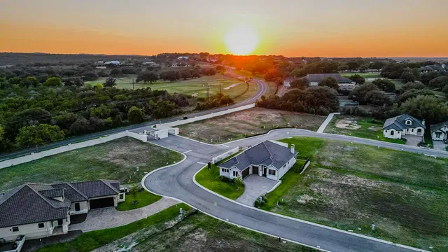 an aerial view of a house with mountain view