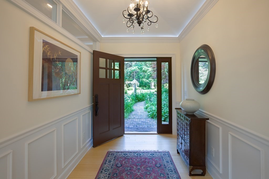 671 Salem End Road Framingham, MA 01702 - Photo 29 of 41 a view of entryway with a front door and wooden floor