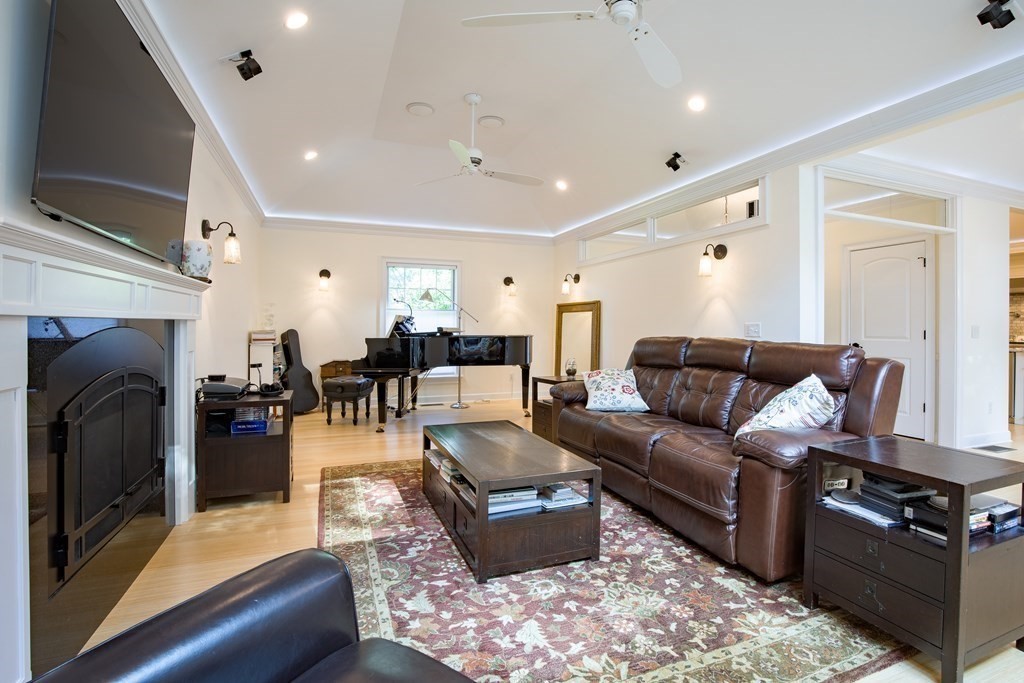 671 Salem End Road Framingham, MA 01702 - Photo 9 of 41 a living room with furniture fireplace and flat screen tv