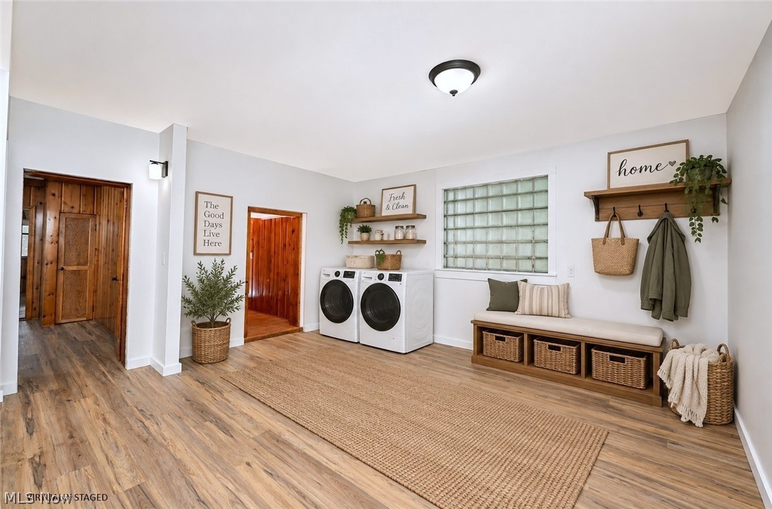 *NICE HUGE FIRST FLOOR LAUNDRY NEAR THE DOUBLE BACK DOOR ENTRANCES W/LUXURY PLANK FLOORING. WOULD MAKE A GREAT MUD RM AND ADDITIONAL SITTING RM AS WELL! ~
