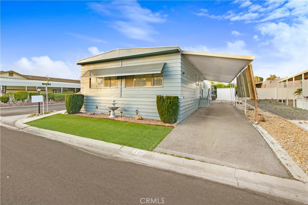 4000 Pierce Street, Unit 232 Riverside, CA 92505 - Photo 1 of 1 a view of a house with a yard