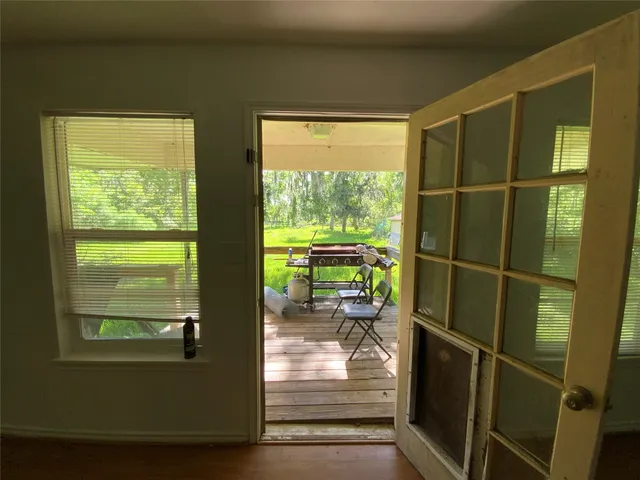 a view of a room with a large window