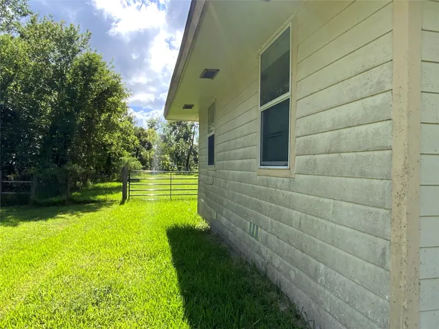 a view of swimming pool with a garden