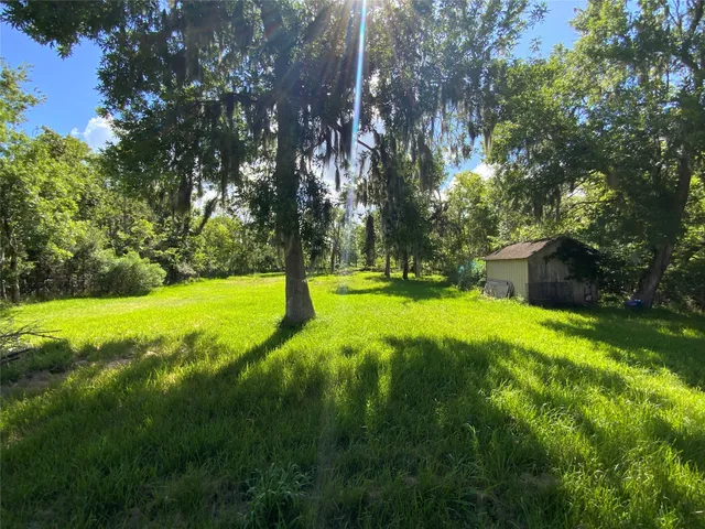 a view of a backyard with a garden