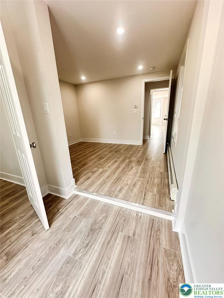44 South Locust Street Mount Carmel, PA 17851 - Photo 18 of 18 a view of an empty room and wooden floor