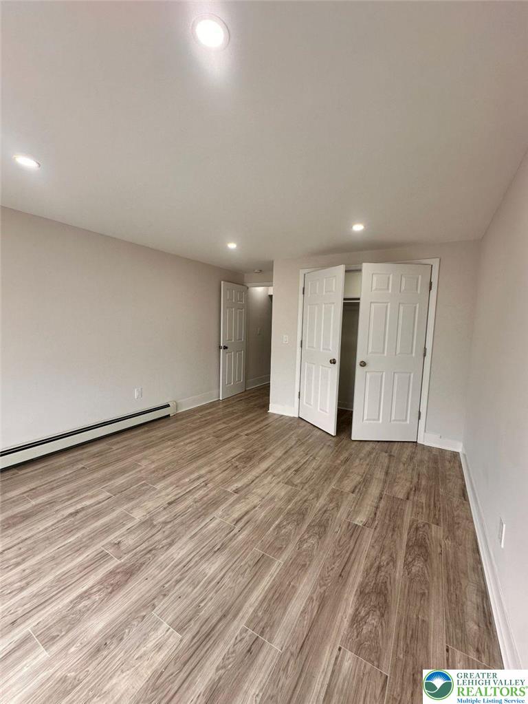 44 South Locust Street Mount Carmel, PA 17851 - Photo 8 of 18 a view of an empty room with wooden floor