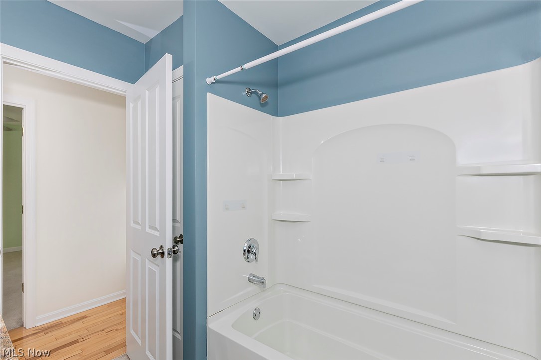 917 Brunswick Road Cleveland Heights, OH 44112 - Photo 30 of 42 Full bathroom with spacious stone countertops, with tub shower combo and linen closet.