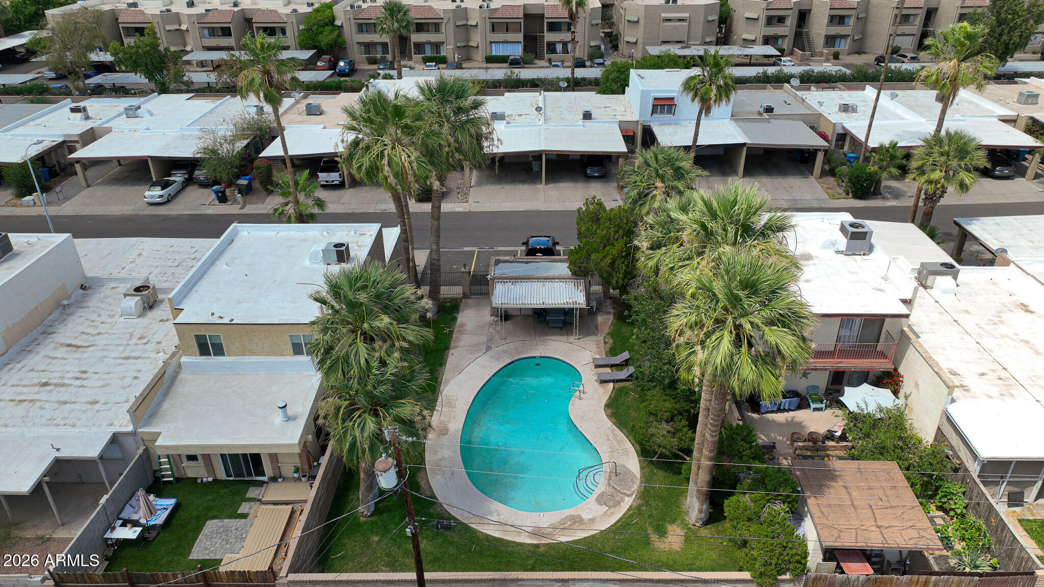 5114 East Monte Vista Road Phoenix, AZ 85008 - Photo 22 of 45 an aerial view of residential houses with outdoor space