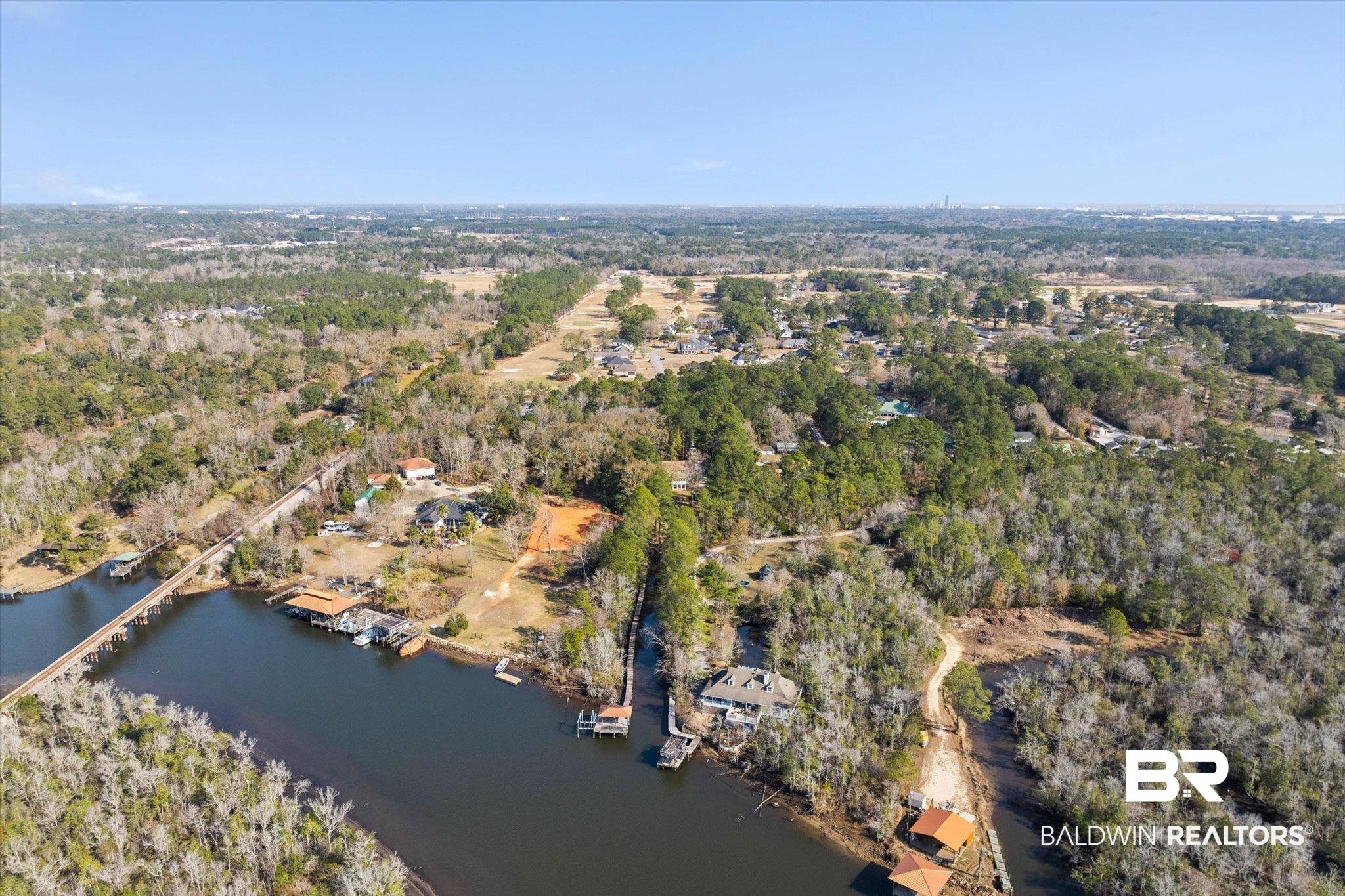 3847 Riviere Du Chien Road Mobile, AL 36693 - Photo 42 of 51 Aerial overview of property's location featuring a forest and a nearby body of water