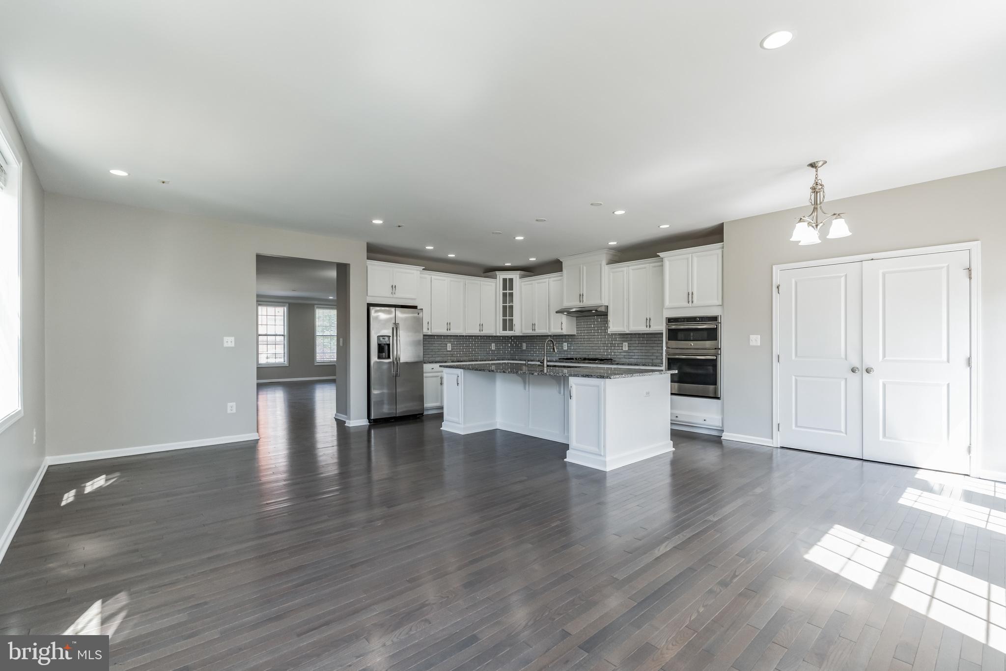 23488 Logans Ridge Terrace Ashburn, VA 20148 - Photo 11 of 58 Family room staged
