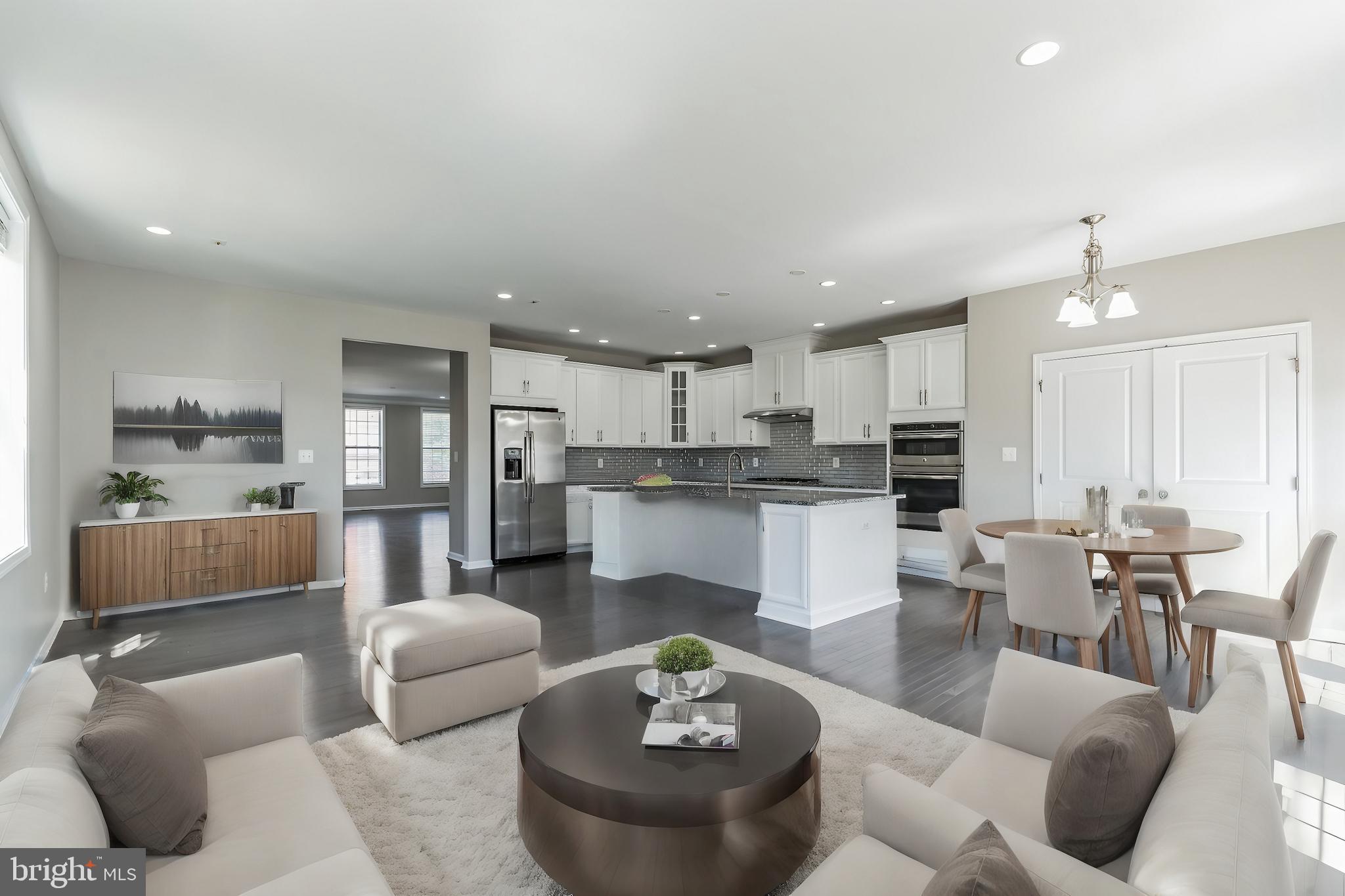 23488 Logans Ridge Terrace Ashburn, VA 20148 - Photo 12 of 58 Family room staged