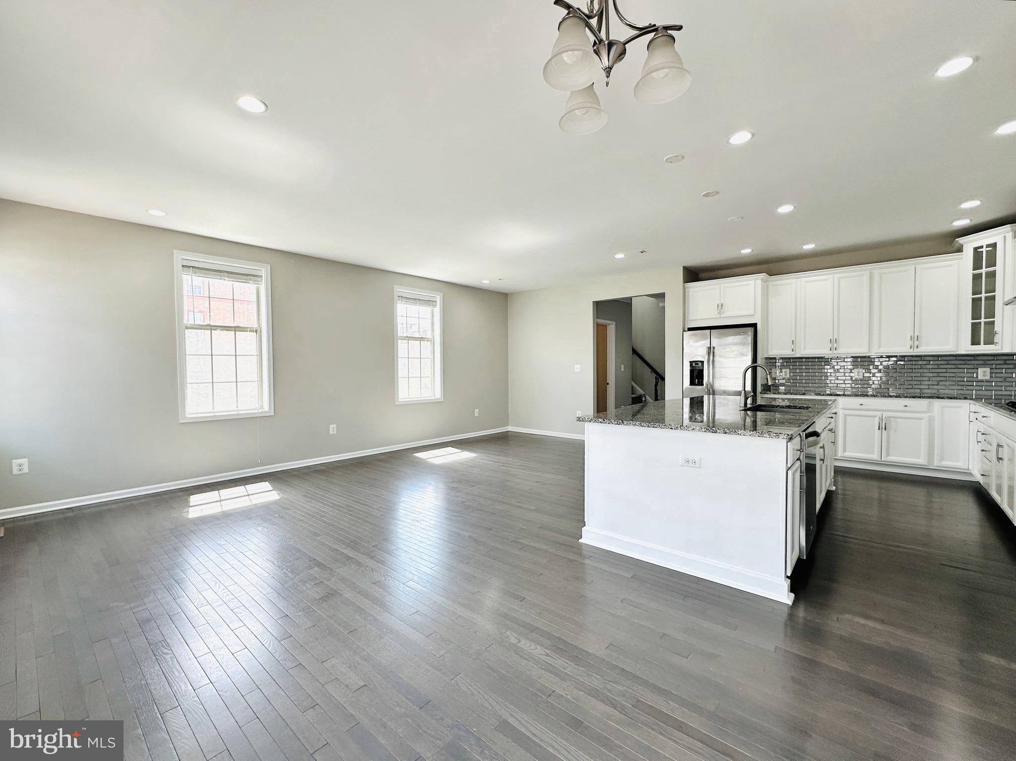 23488 Logans Ridge Terrace Ashburn, VA 20148 - Photo 18 of 58 Family room/Kitchen