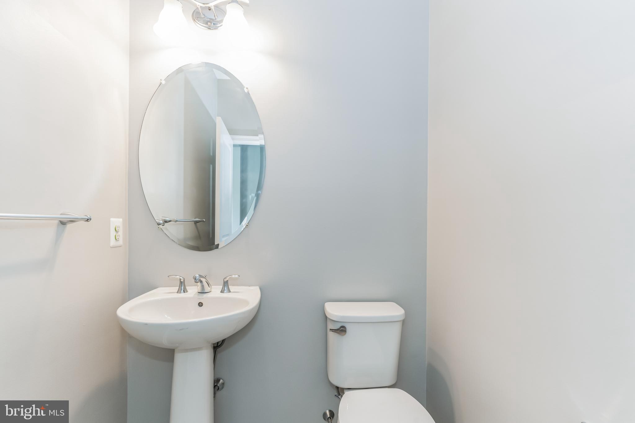 23488 Logans Ridge Terrace Ashburn, VA 20148 - Photo 19 of 58 Half bath on main level