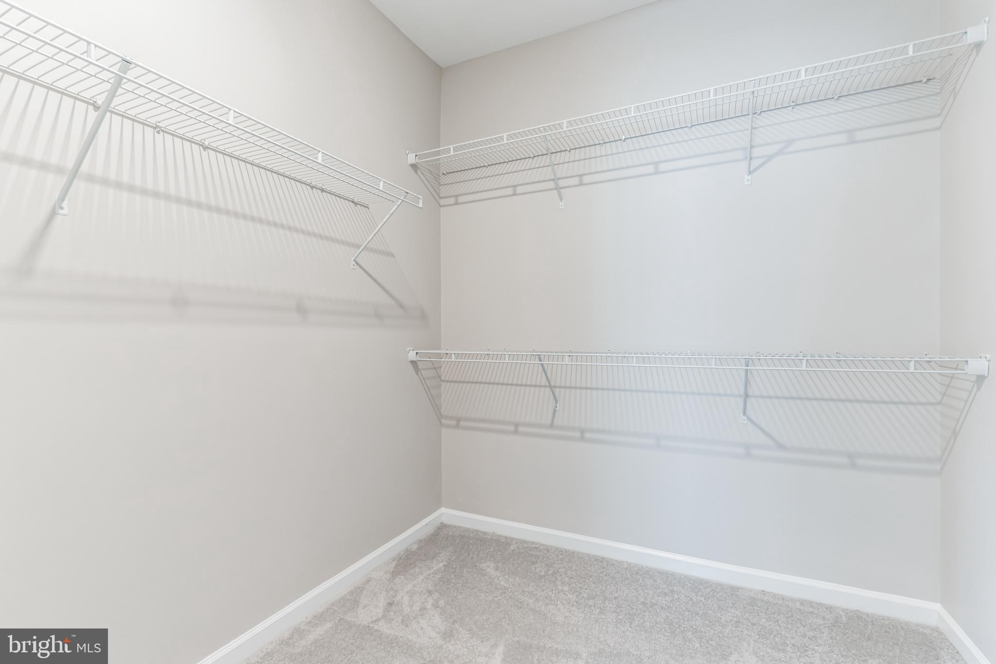 23488 Logans Ridge Terrace Ashburn, VA 20148 - Photo 26 of 58 Master bedroom closet 1