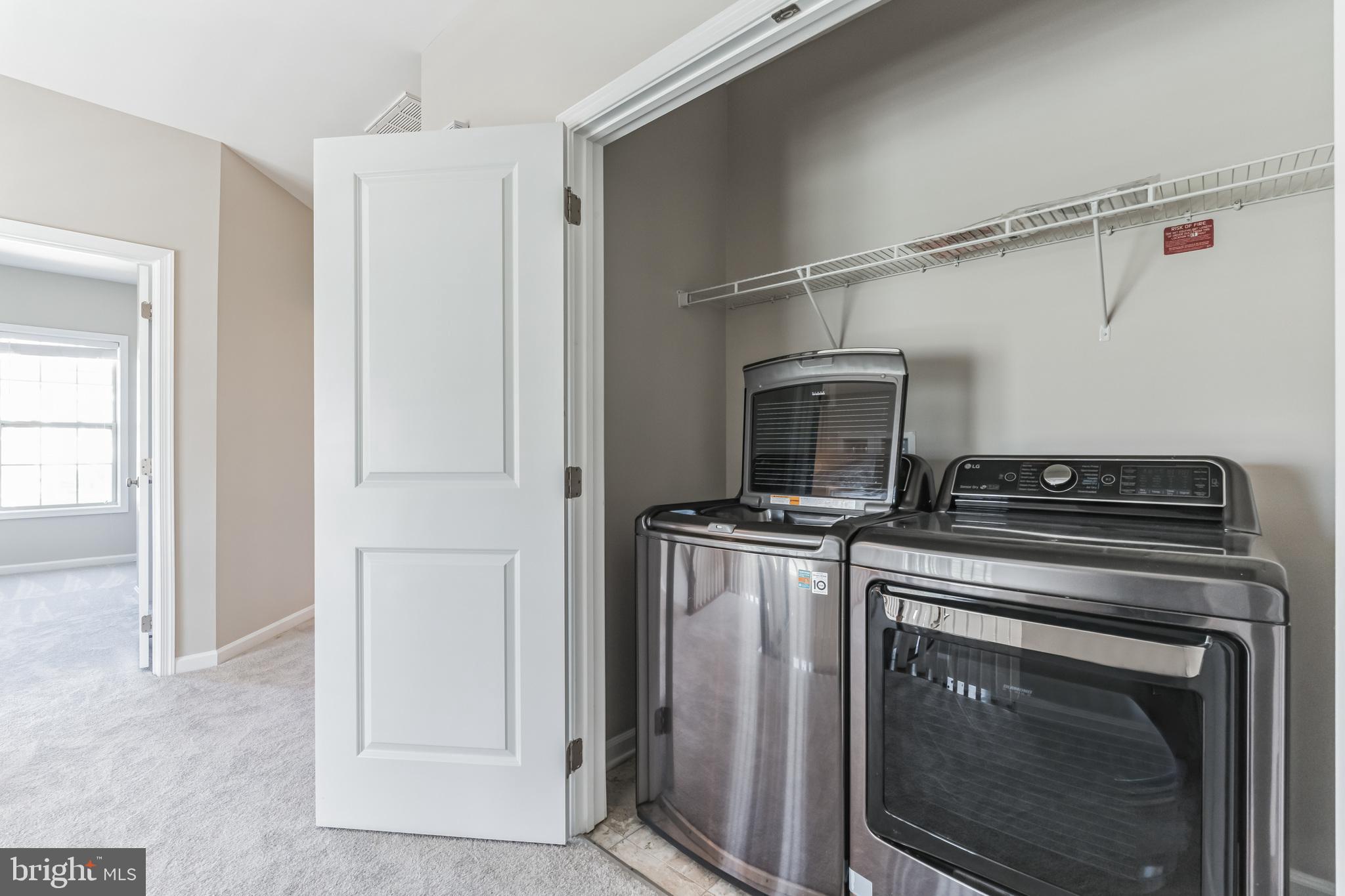 23488 Logans Ridge Terrace Ashburn, VA 20148 - Photo 38 of 58 Laundry on upper level
