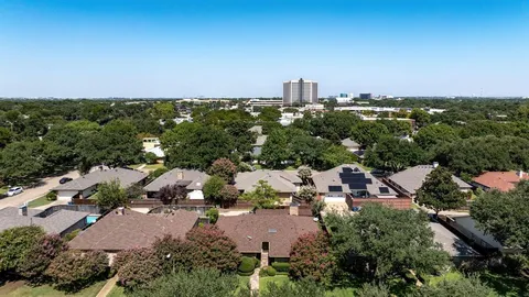 an aerial view of multiple house with outdoor space