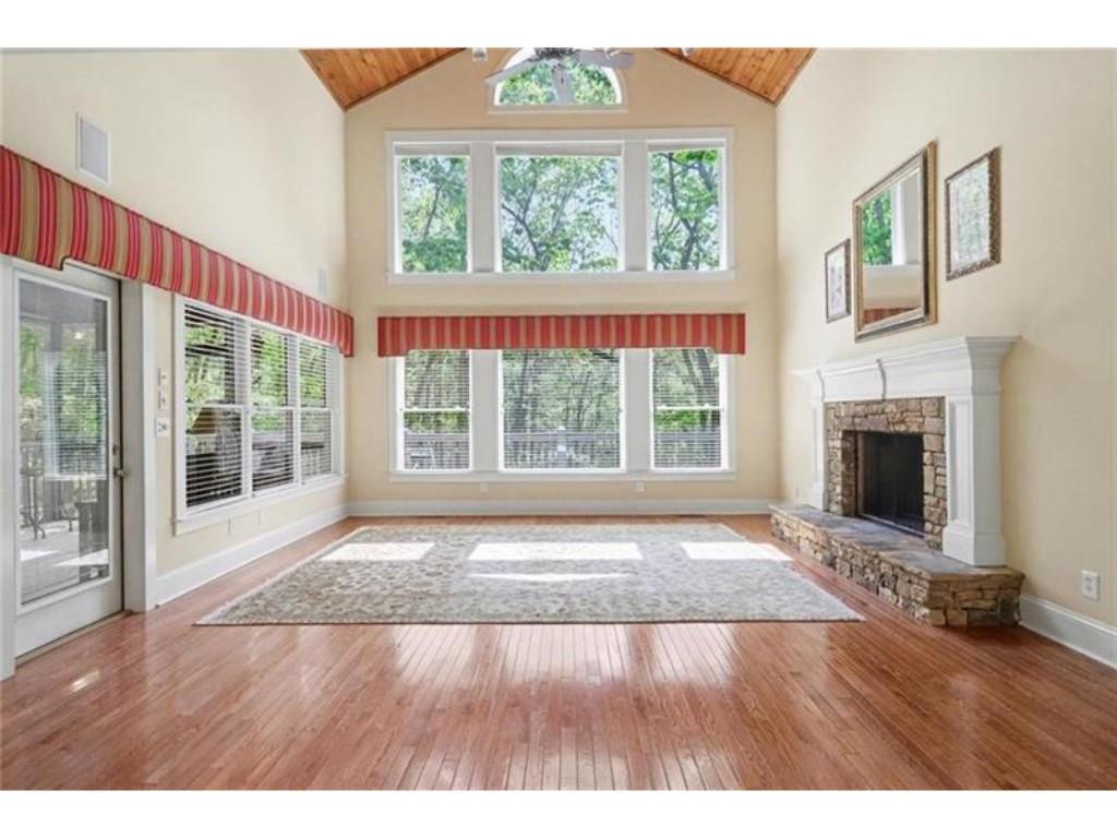 53 Pinto Place Jasper, GA 30143 - Photo 6 of 62 a view of an empty room with wooden floor and a window