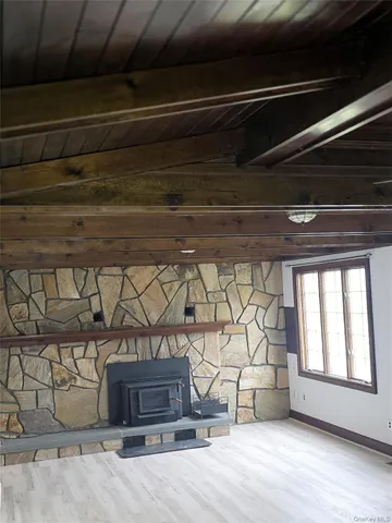 a view of kitchen with cabinets and wooden floor