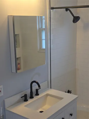 an empty room with a empty space and windows