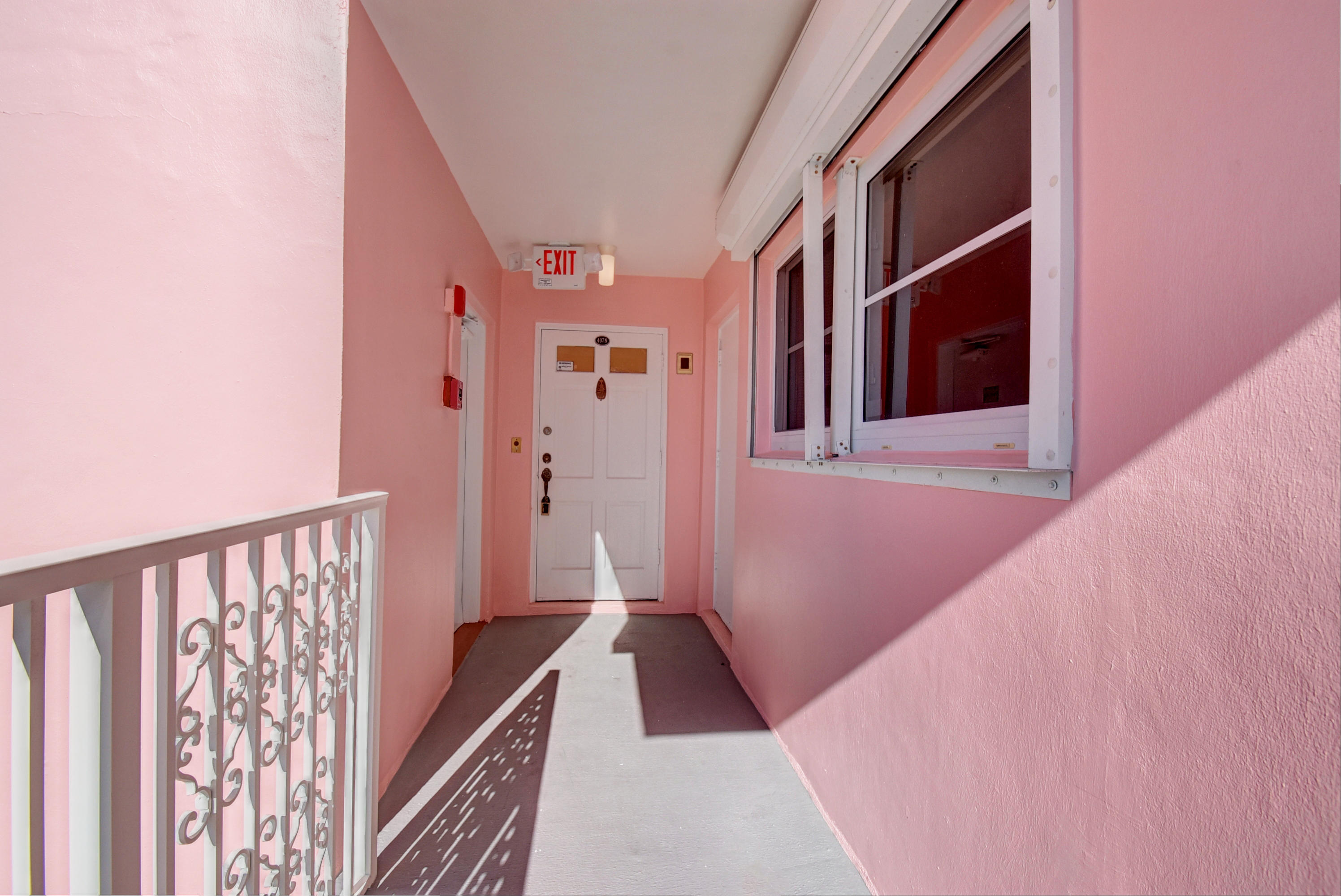 1001 East Camino Real, Unit 407 Boca Raton, FL 33432 - Photo 31 of 49 Front door right by the stairs!