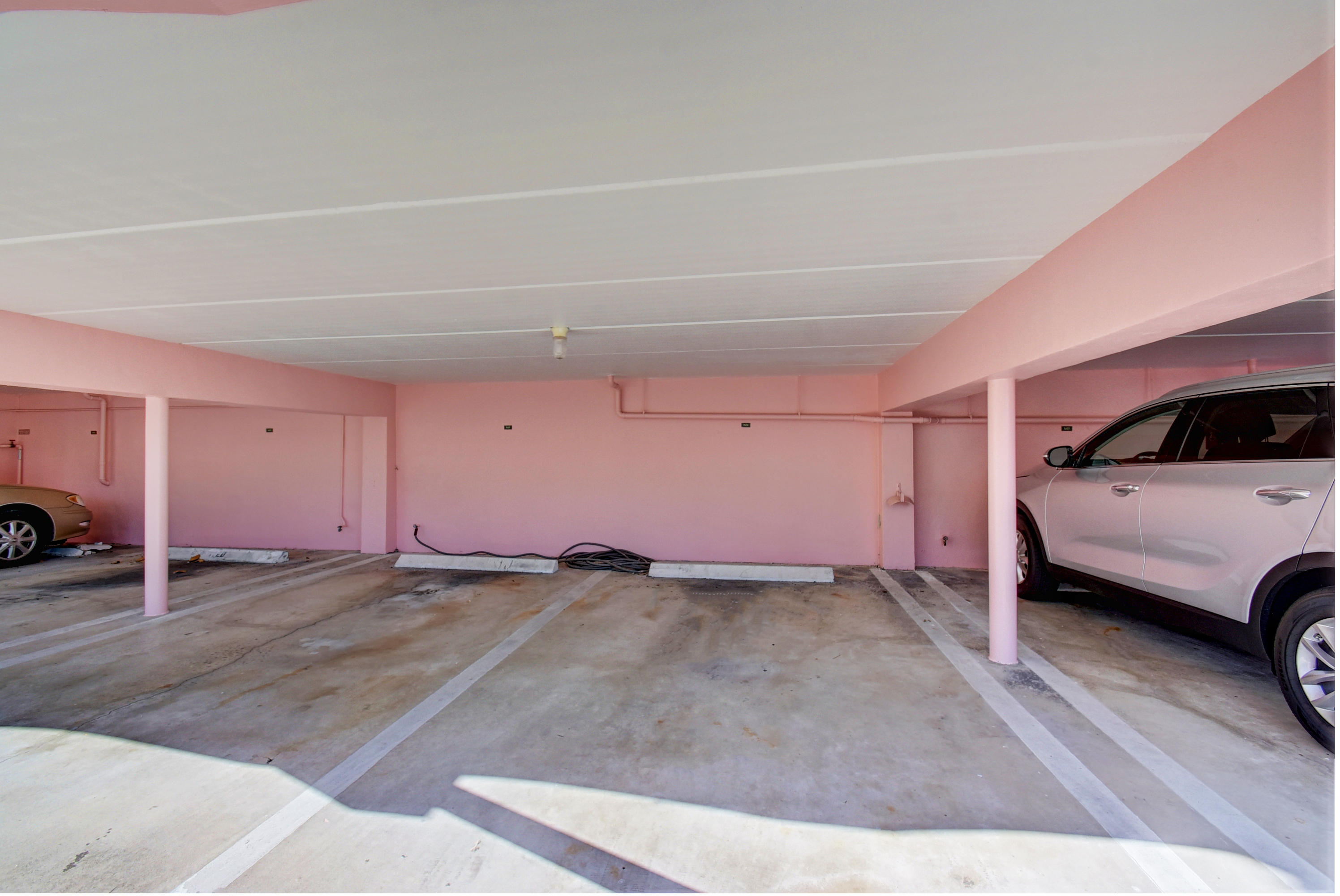 1001 East Camino Real, Unit 407 Boca Raton, FL 33432 - Photo 34 of 49 Your assigned carport space!