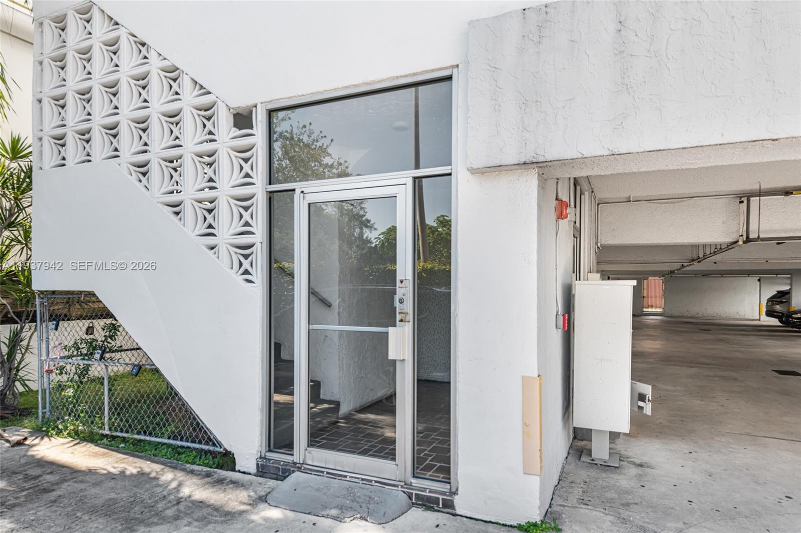 1250 Alton Road, Unit 3A Miami Beach, FL 33139 - Photo 17 of 25 a view of entryway with wooden floor and staircase