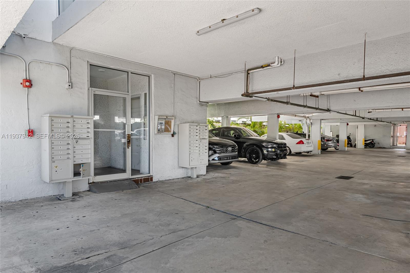 1250 Alton Road, Unit 3A Miami Beach, FL 33139 - Photo 19 of 25 a view of parking garage with cars