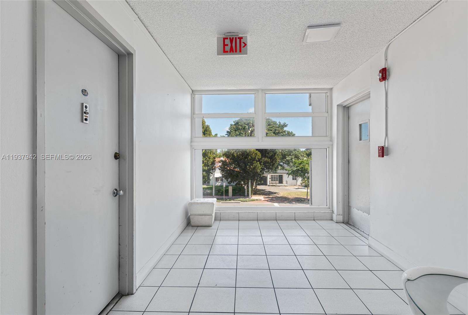 1250 Alton Road, Unit 3A Miami Beach, FL 33139 - Photo 4 of 25 a view of an empty room and window