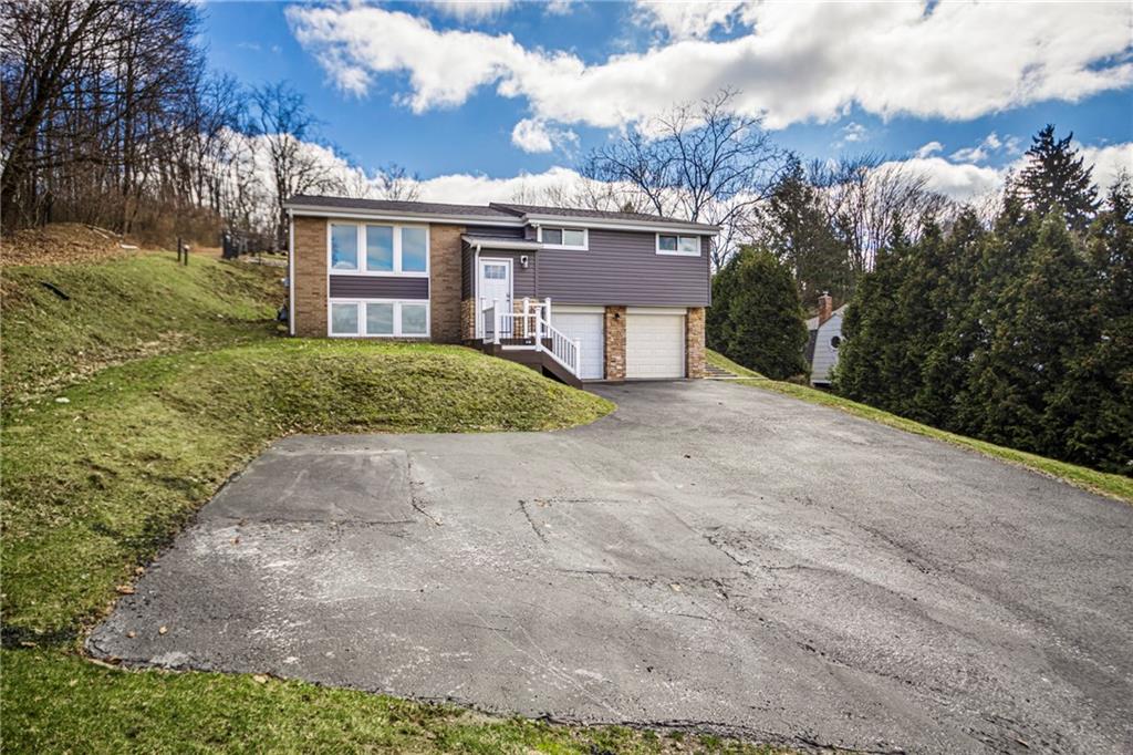 247 West Ingomar Road Pittsburgh, PA 15237 - Photo 36 of 36 a view of a house with a yard