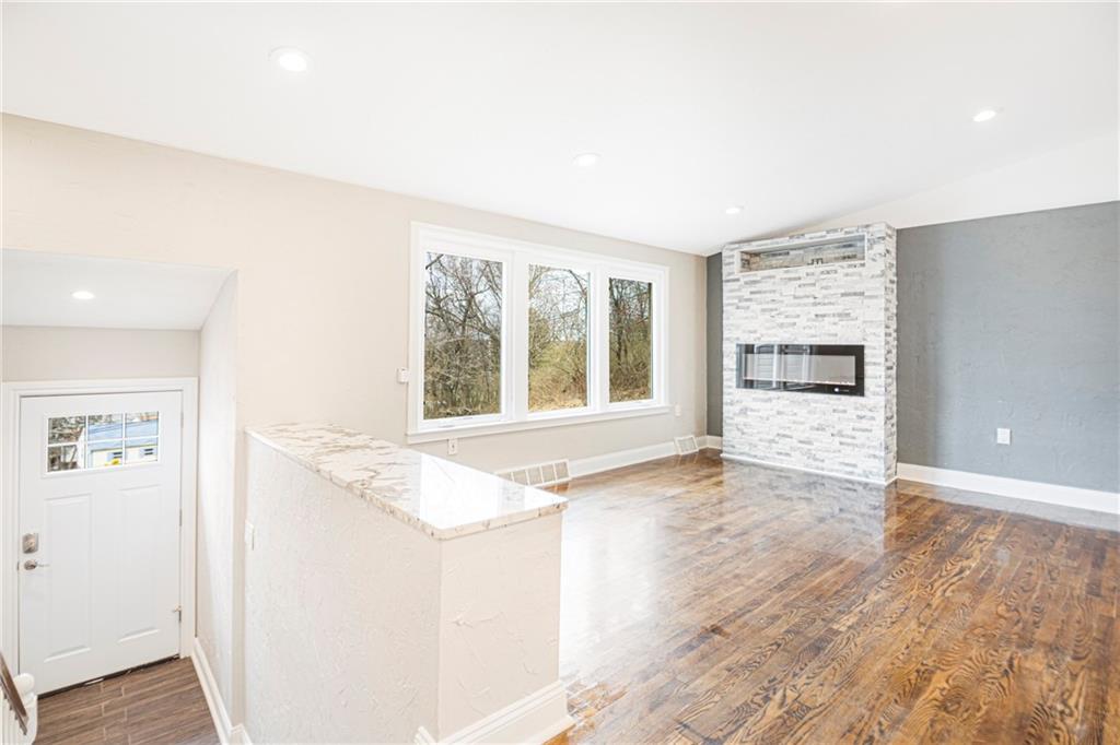 247 West Ingomar Road Pittsburgh, PA 15237 - Photo 4 of 36 an empty room with windows and entrance