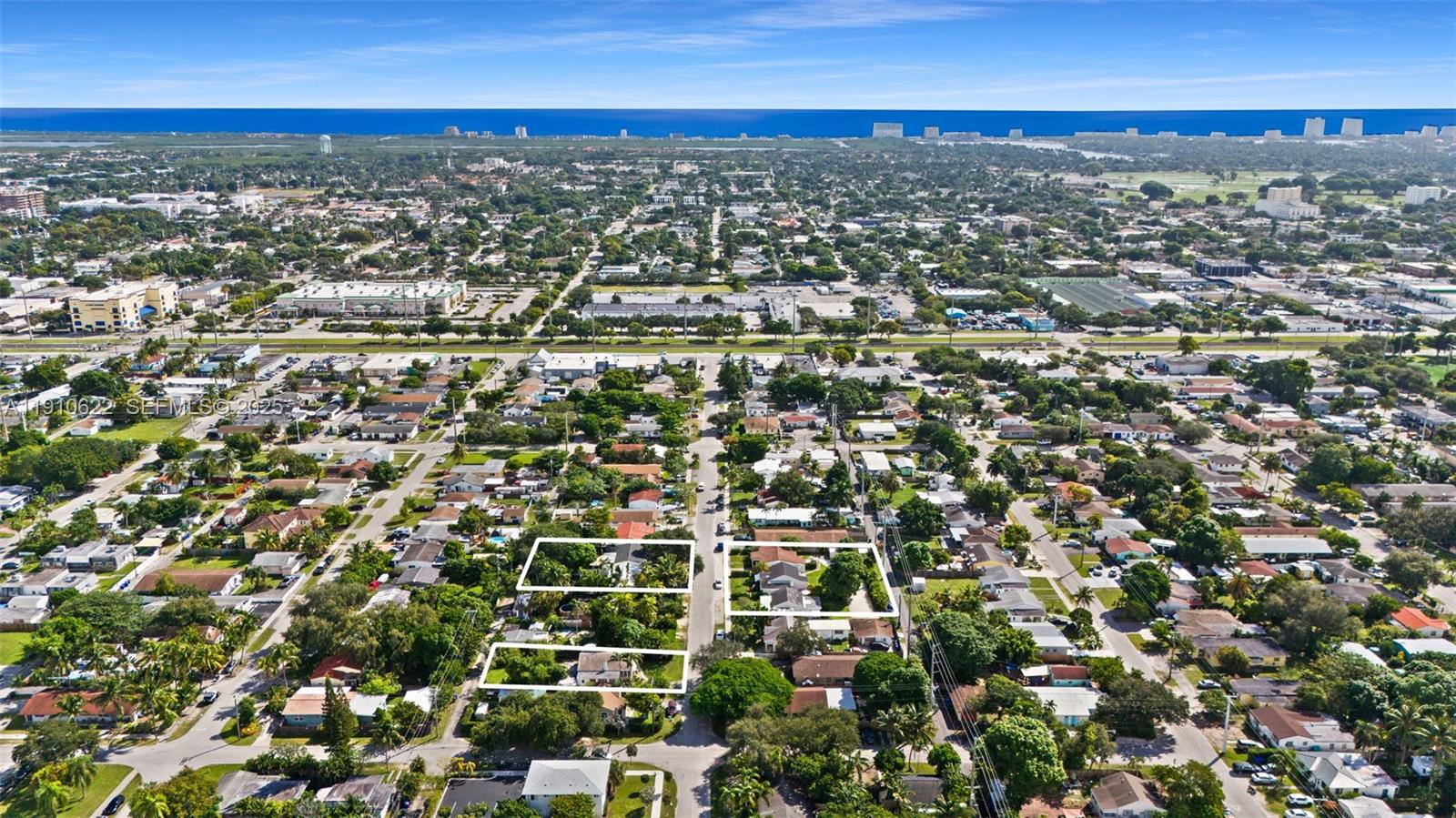 2227 Cleveland Street Hollywood, FL 33020 - Photo 6 of 11 an aerial view of residential houses with city view