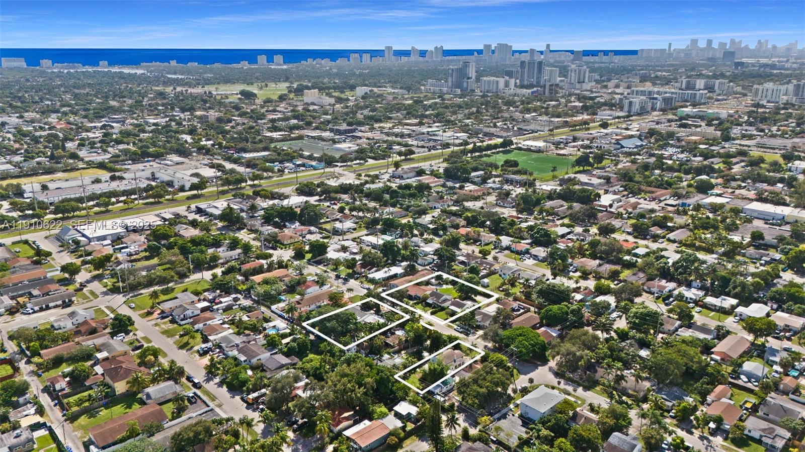 2227 Cleveland Street Hollywood, FL 33020 - Photo 7 of 11 an aerial view of residential houses with city view