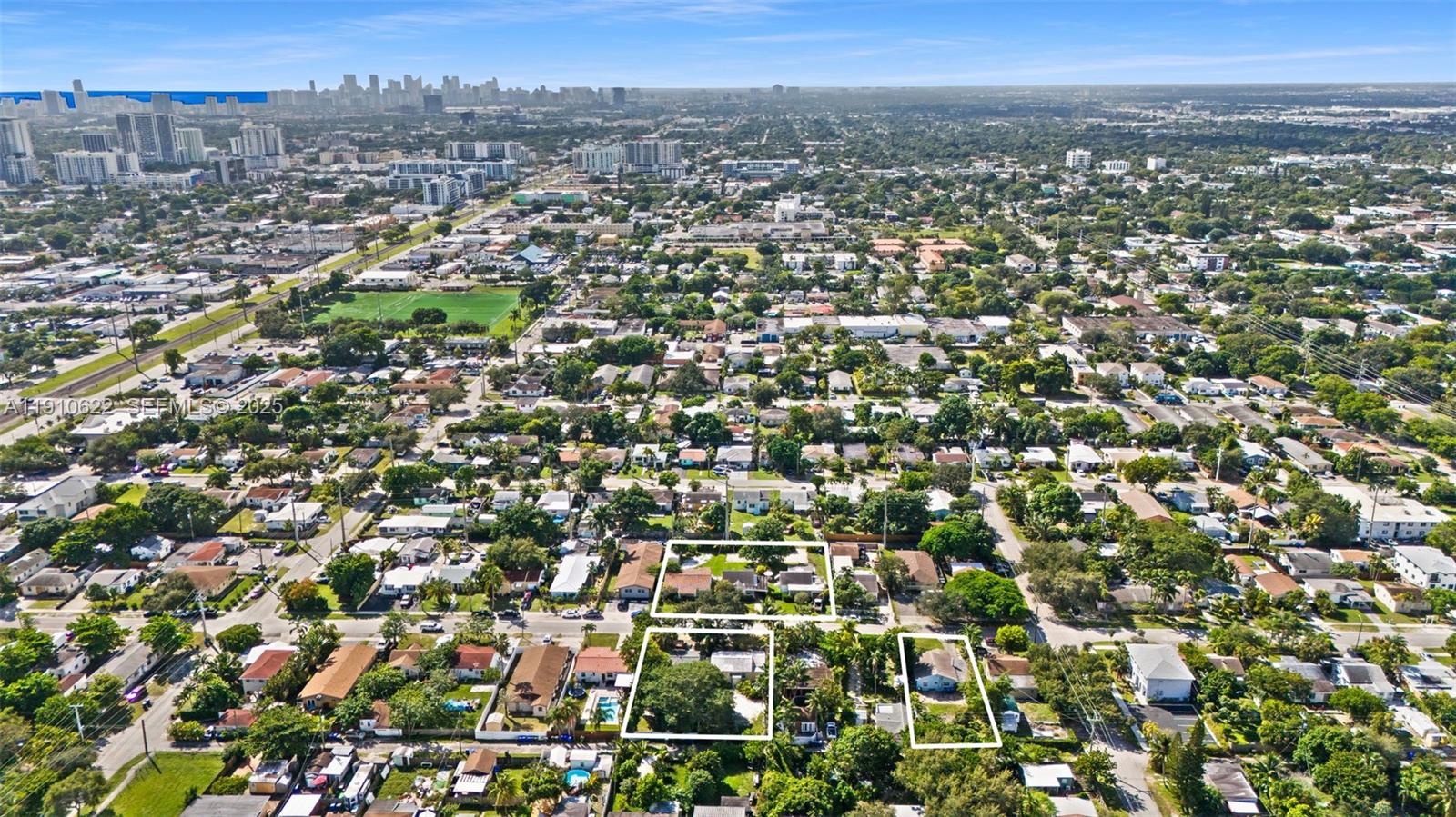 2227 Cleveland Street Hollywood, FL 33020 - Photo 8 of 11 an aerial view of multiple house