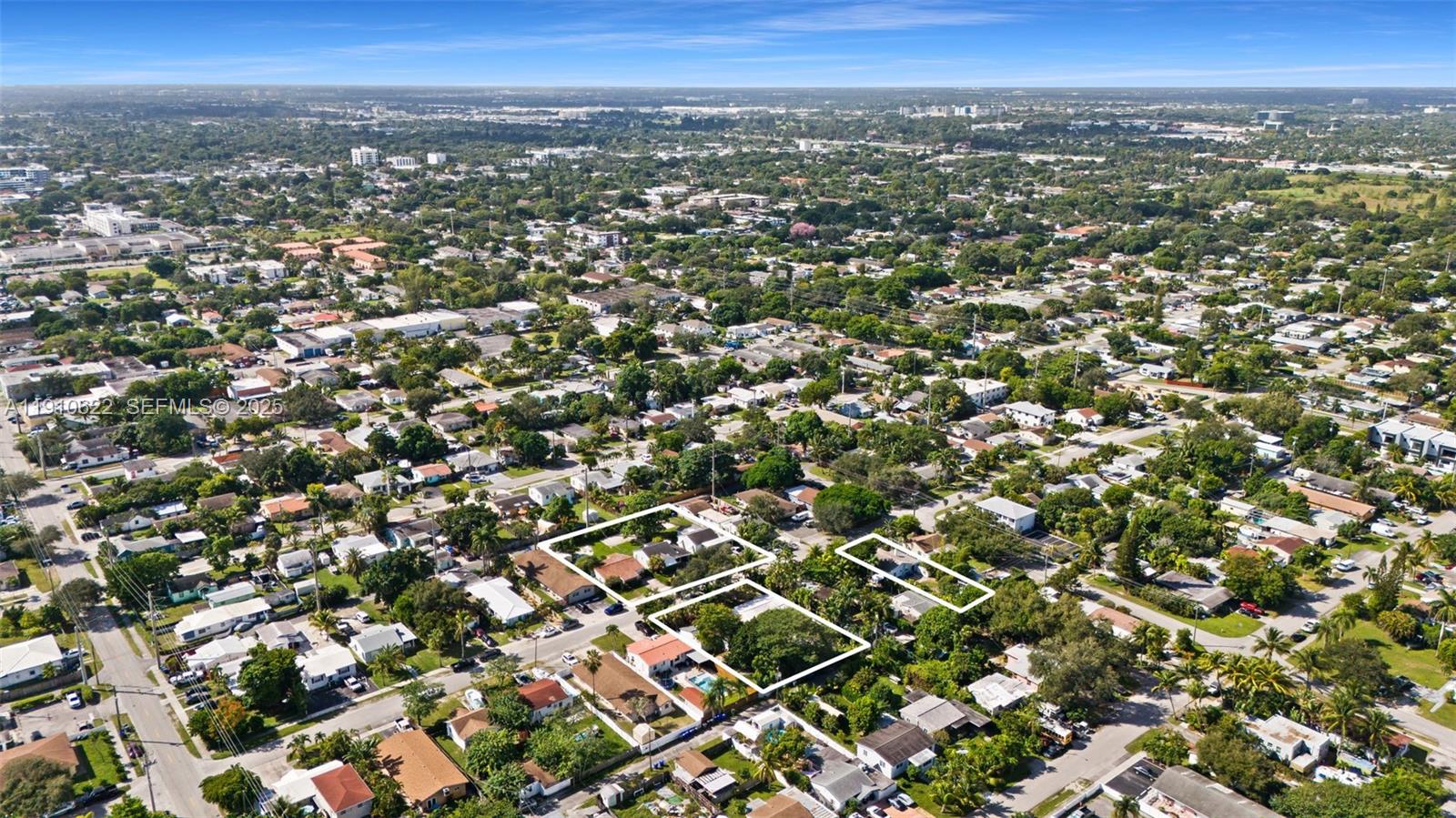 2227 Cleveland Street Hollywood, FL 33020 - Photo 9 of 11 an aerial view of residential houses with city view