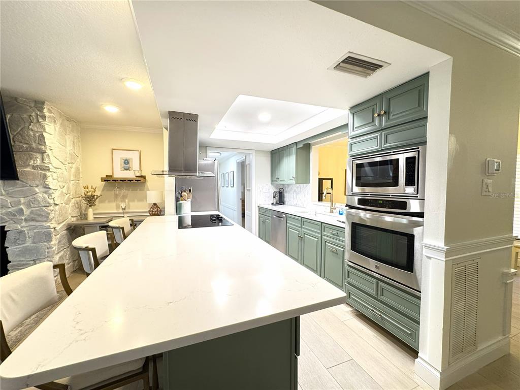 1004 Southeast 5th Avenue Crystal River, FL 34429 - Photo 11 of 43 a kitchen with a sink appliances and cabinets