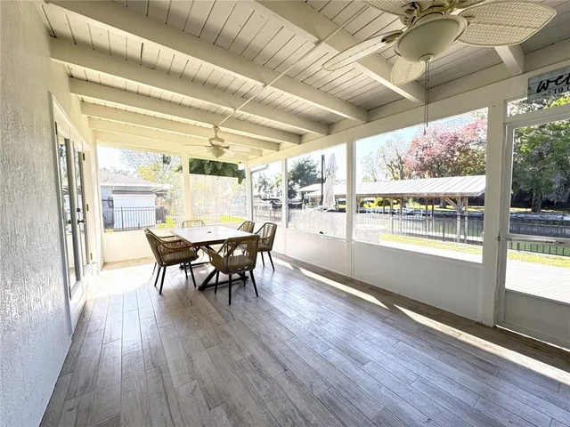 a dining room with furniture window wooden floor