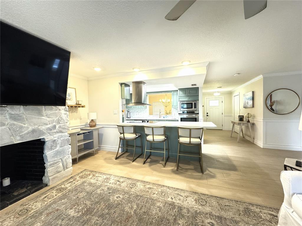 1004 Southeast 5th Avenue Crystal River, FL 34429 - Photo 9 of 43 a large kitchen with a table and chairs in it