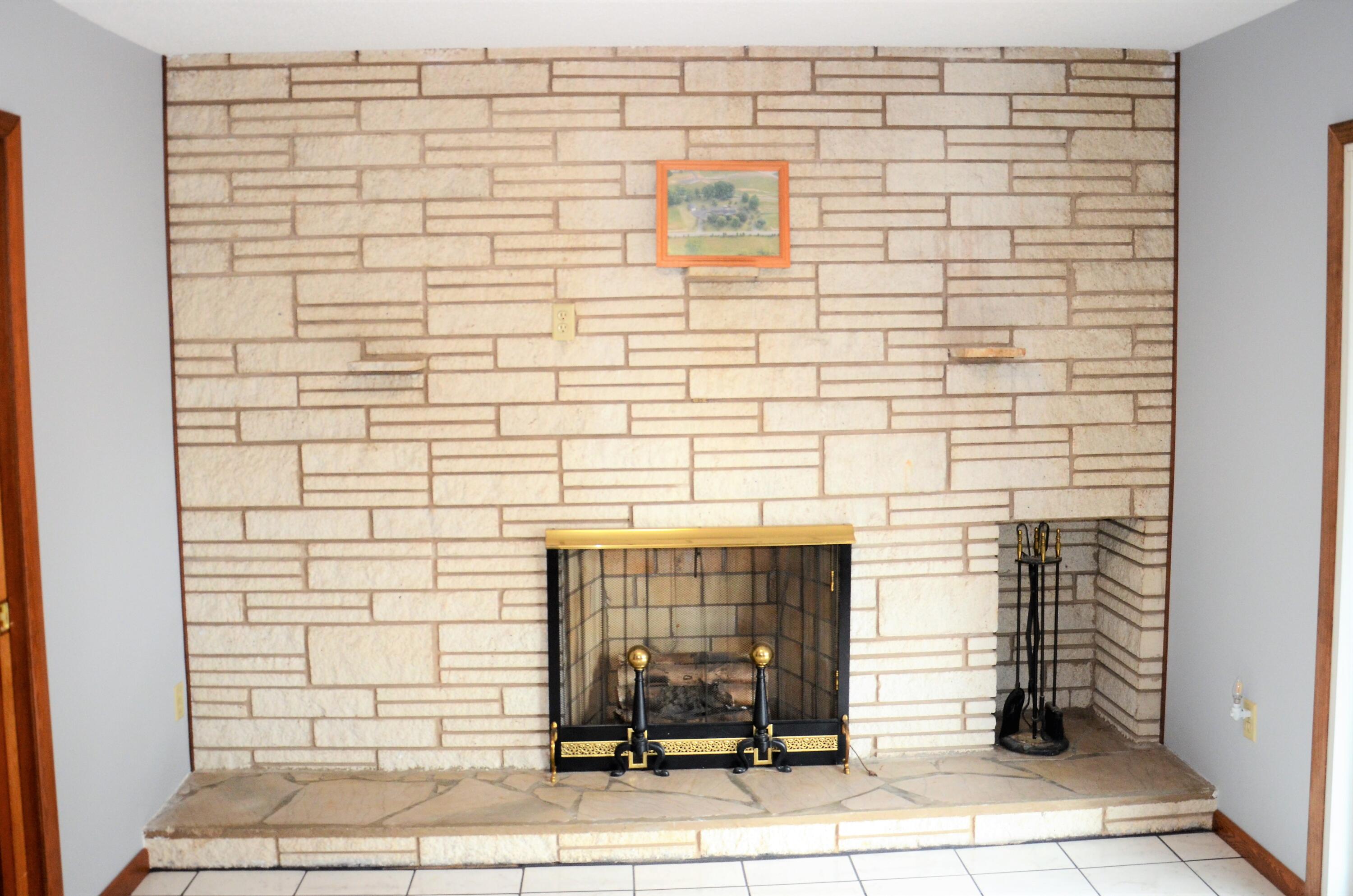 405 Sells Road Bluff City, TN 37618 - Photo 16 of 42 White Fireplace Near Kitchen