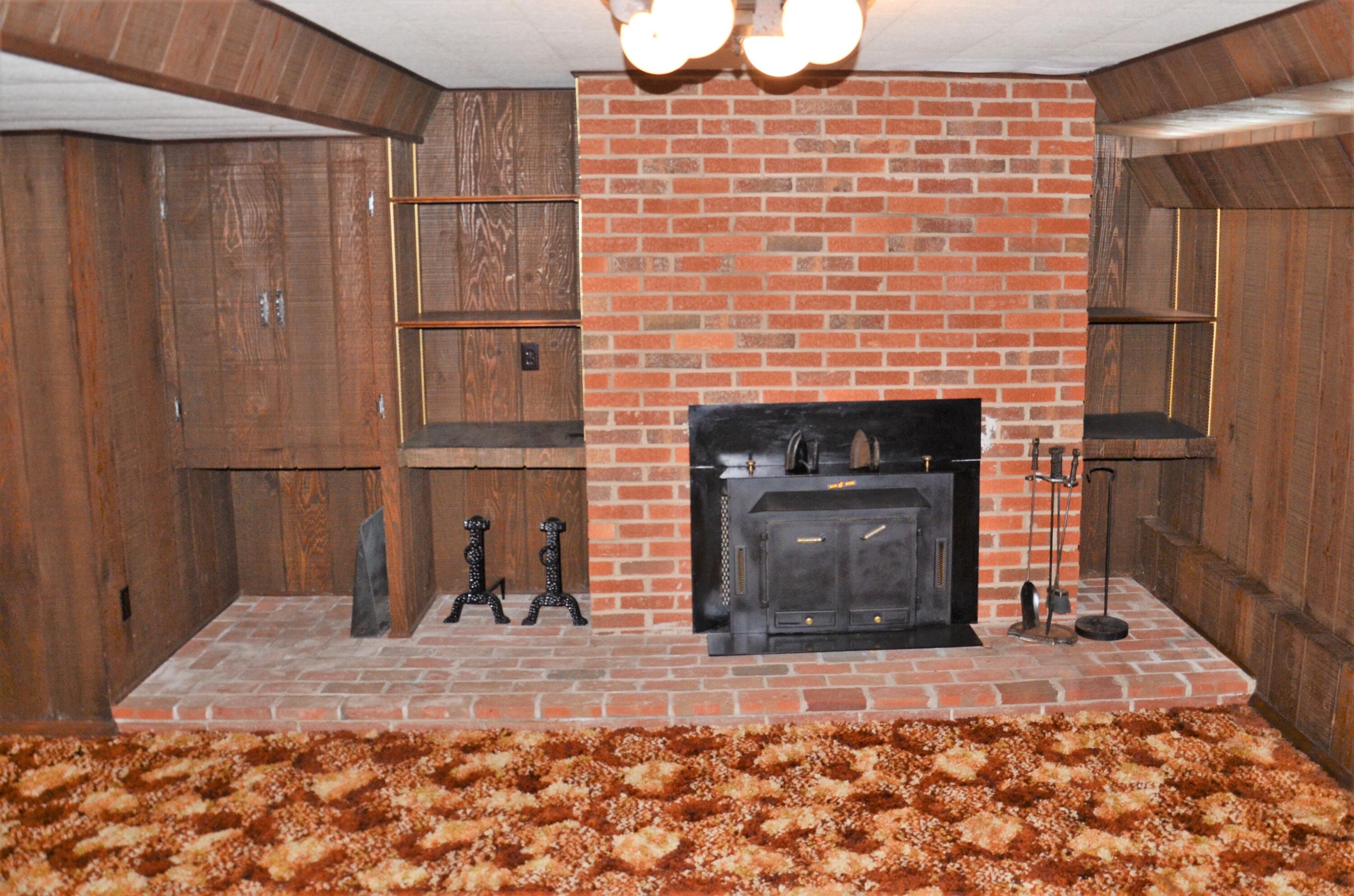 405 Sells Road Bluff City, TN 37618 - Photo 32 of 42 Fireplace in Basement
