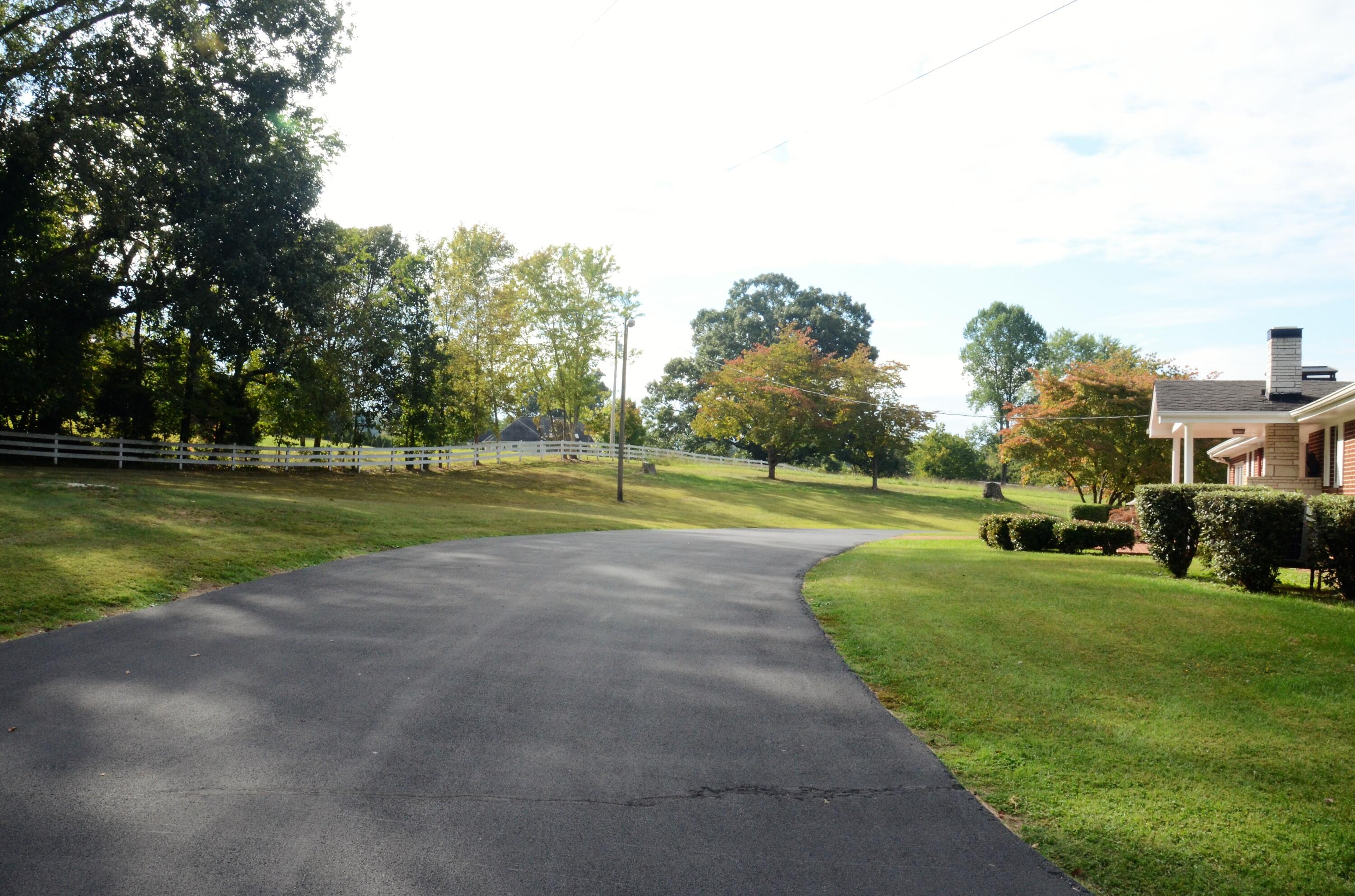 405 Sells Road Bluff City, TN 37618 - Photo 7 of 42 7 Long Paved Driveway