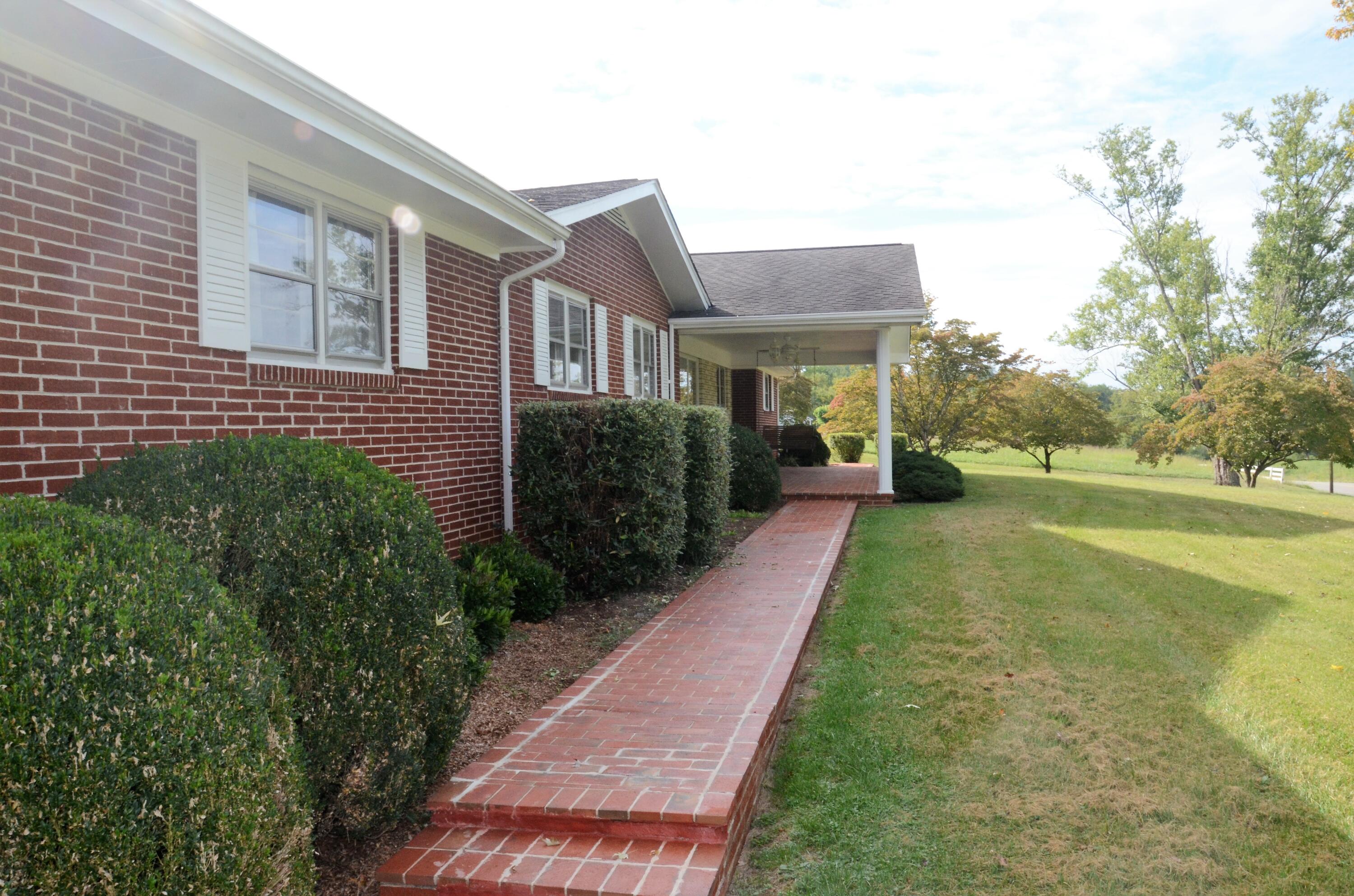 405 Sells Road Bluff City, TN 37618 - Photo 10 of 42 10 Paved Brick Sidewalk