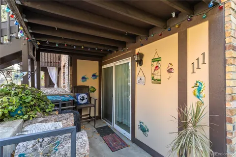 a view of a balcony with a potted plant