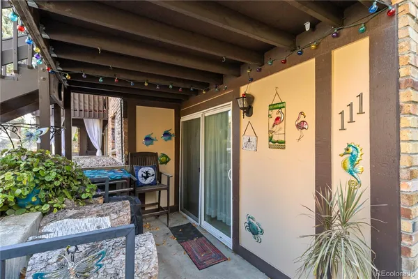 a view of a balcony with a potted plant