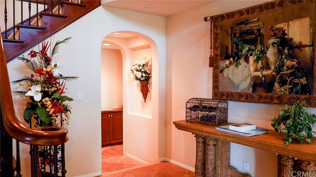 19 Calle Pacifica San Clemente, CA 92673 - Photo 2 of 10 a vase sitting on a table and a potted plant